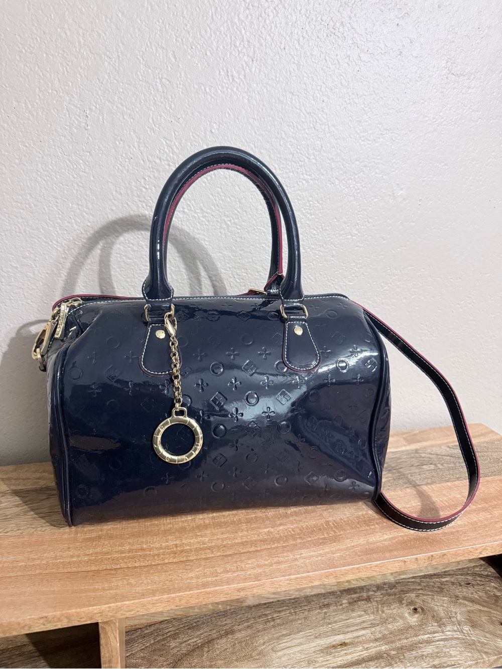 Invece Glossy Embossed Patent Satchel in Dark Blue with Gold Accent Charm